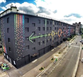 Μια εντυπωσιακή ιδέα - Άλλαξε την εμφάνιση ενός βαρετού κτηρίου με 15.000 χάρτινα πουλιά (φωτό)