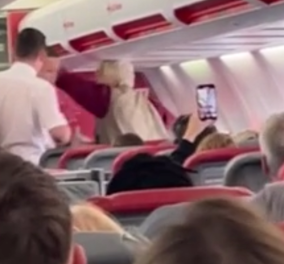 Σοκαριστικό βίντεο:  Γυναίκα σε πτήση για Ρόδο ούρησε στο κάθισμα, έριξε χαστούκια & πήγε ν' ανοίξει την πόρτα