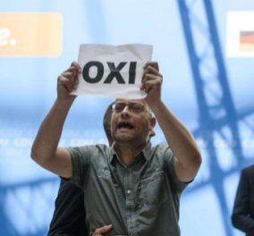 Έλληνες ακτιβιστές διέκοψαν σήμερα την ομιλία της Μέρκελ
