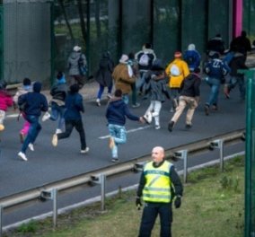 "Χάος" στη Γαλλία - Ένταση με πάνω από 800 μετανάστες να επιχειρούν να μπουν στη σήραγγα της Μάγχης - Κυρίως Φωτογραφία - Gallery - Video