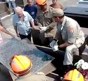 Ζωντανός άνθρωπος βρέθηκε μέσα σε φέρετρο στην Βραζιλία - Τον εντόπισαν από κηλίδες αίματος   - Κυρίως Φωτογραφία - Gallery - Video