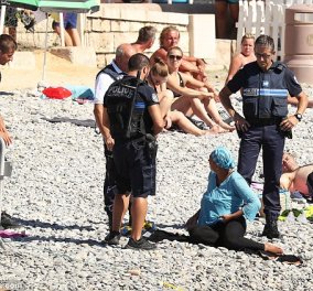 Καρέ- καρέ πως ο Γάλλος αστυνομικός υποχρεώνει την μουσουλμάνα να βγάλει το μπουρκίνι στην παραλία   - Κυρίως Φωτογραφία - Gallery - Video