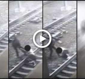 Βίντεο που κόβει την ανάσα: Αστυνομικός τράβηξε από τις ράγες άντρα δευτερόλεπτα πριν περάσει το τρένο