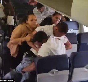 Βίντεο: Αρπάχτηκαν στο ξύλο & έγινε της κακομοίρας μέσα στο αεροπλάνο - Κυρίως Φωτογραφία - Gallery - Video