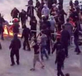Νύχτα τρόμου στην Αθήνα -  Χούλιγκαν εισέβαλαν σε γήπεδα, χτύπησαν κόσμο, έκαψαν αυτοκίνητα! (φώτο- βίντεο)