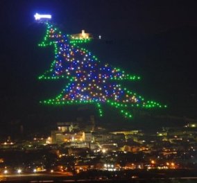 Ιταλία: Φωτίστηκε και φέτος το μεγαλύτερο χριστουγεννιάτικο δέντρο στον κόσμο - ύψους 750 μέτρων & πλάτους 450 (βίντεο)