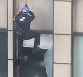 Εντυπωσιακό βίντεο ημέρας: Απειλούσε να πέσει από τον 31ο όροφο - Δείτε την κινηματογραφική διάσωσή του